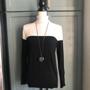 Turtleneck color block sweater.
